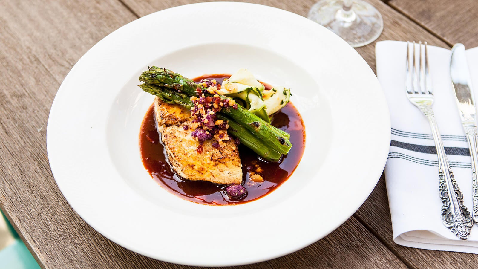 Grilled salmon with asparagus and brown butter sage sauce