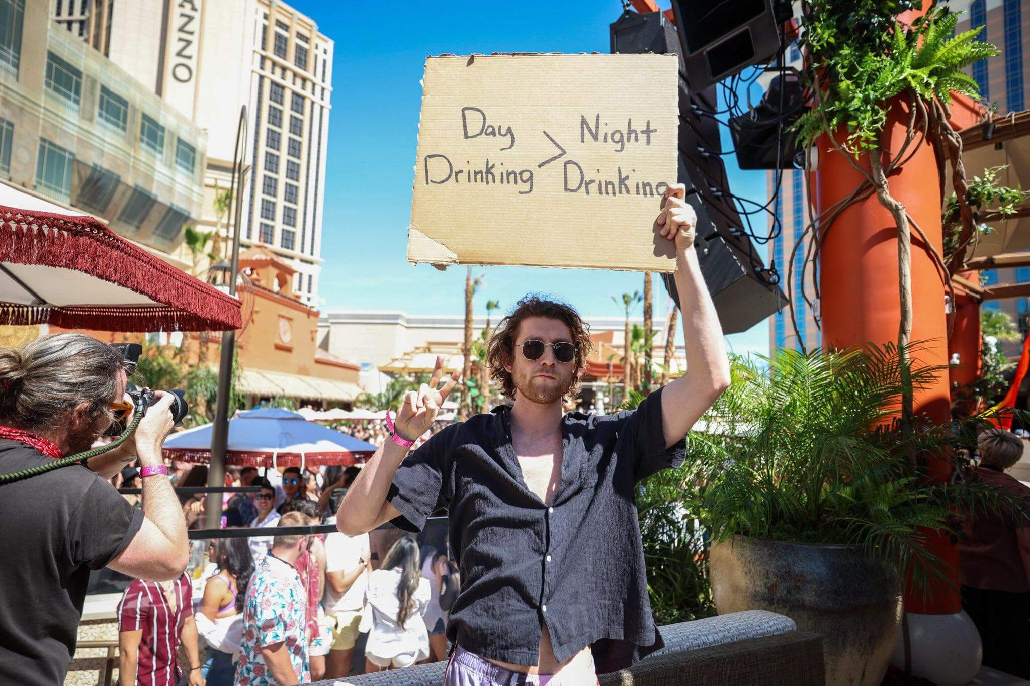 TAO Beach Dayclub Dude With Sign