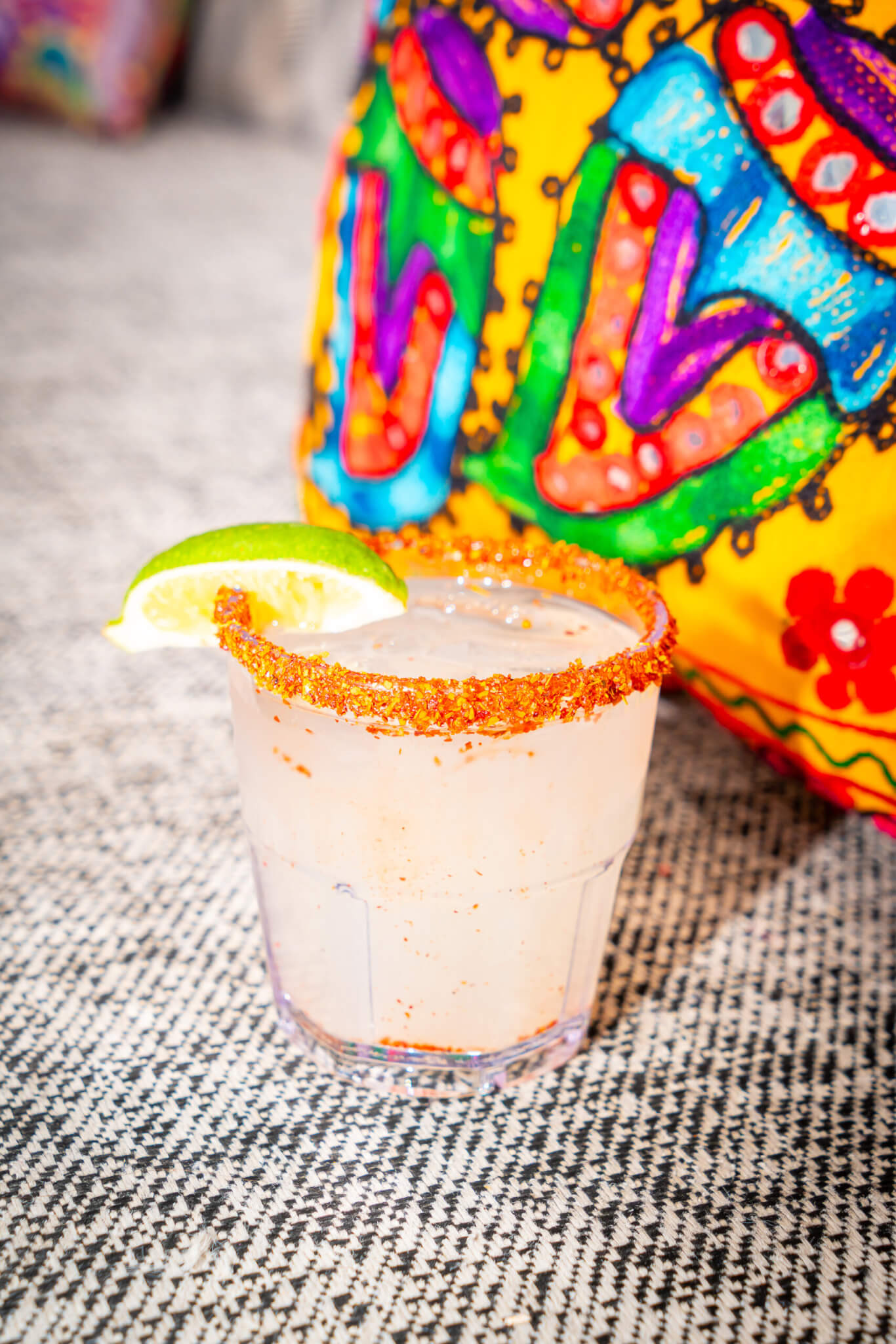 cocktail with tajin and lime