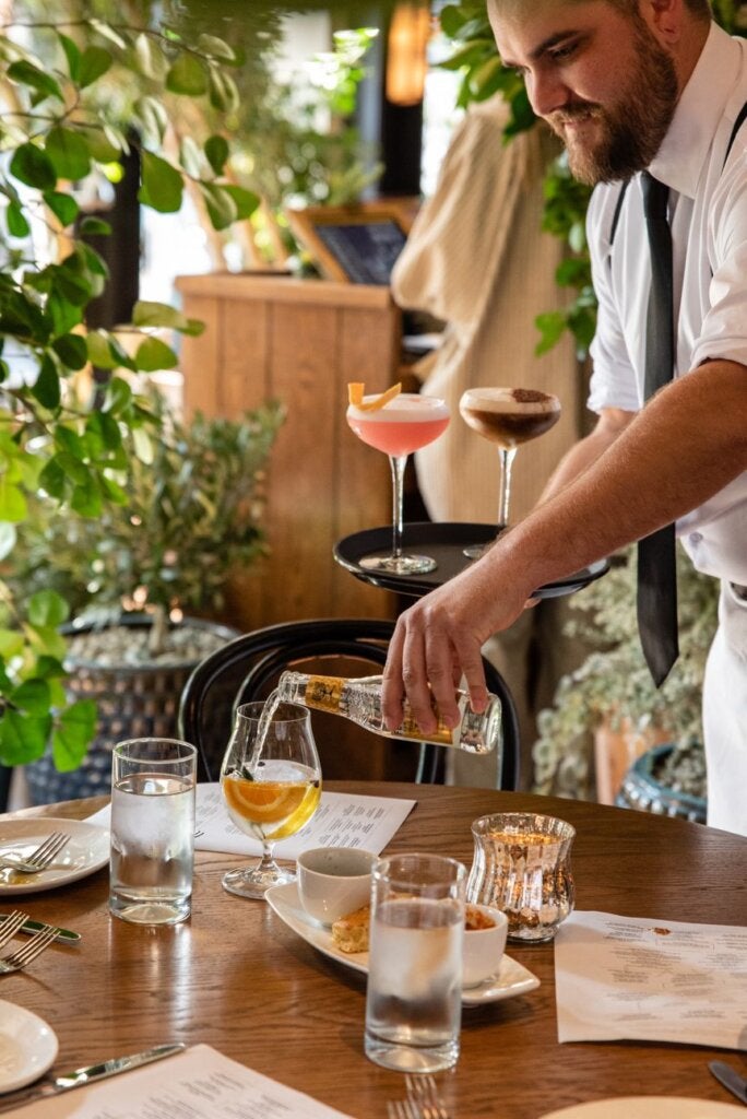 Lavo San Diego server pouring drink