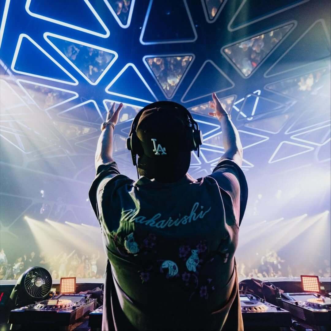 DJ under grid at Hakkasan