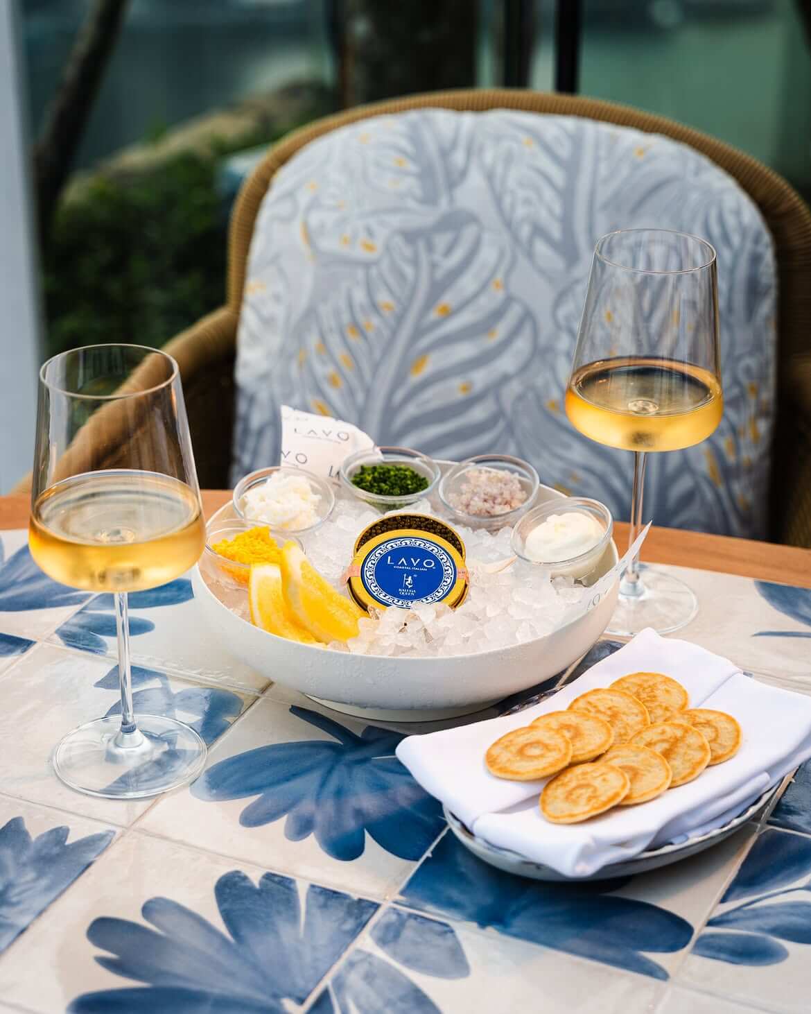 caviar tray with wine glasses