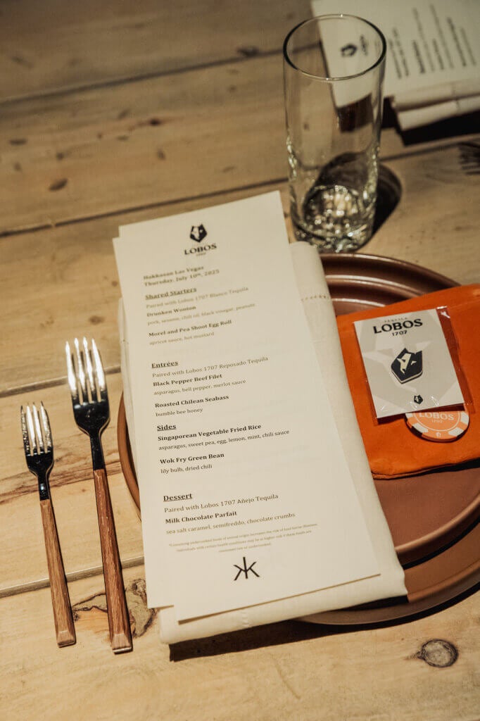 menu and plates and silverware and glass