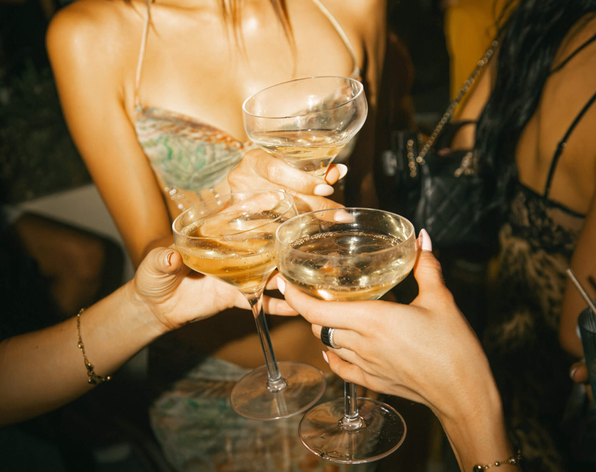 Girls holding champagne glasses